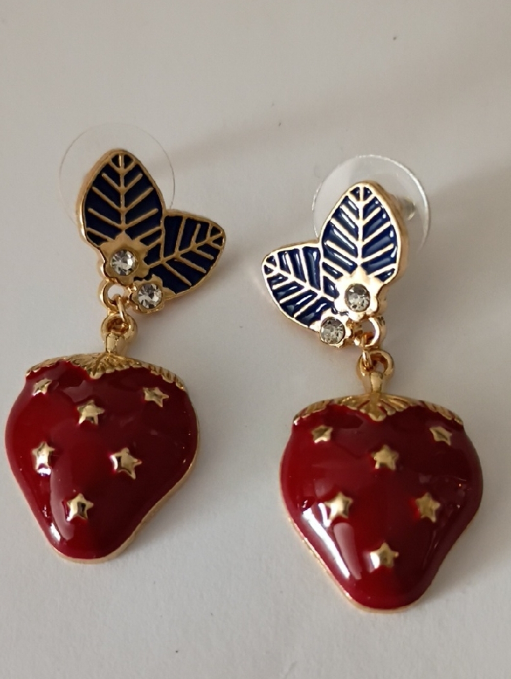 Gold-Tone Red Strawberry Drop Earrings with Blue Leaf Accents